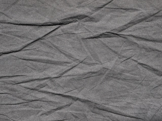 Black fabric crumpled texture