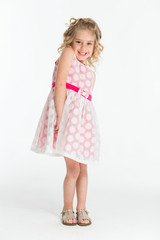 Pretty blonde kid on white background