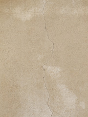 Grunge concrete cement wall with crack in industrial building, great for your design and texture background