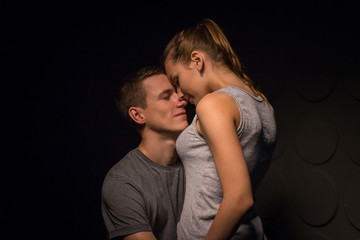 Passionate young couple in the room