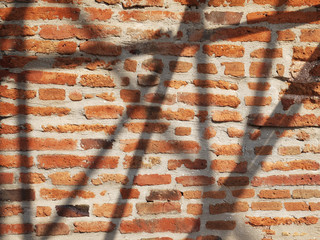 shadow on brick wall