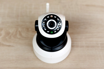 The CCTV security camera operating in home.