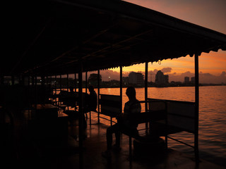 Fototapeta premium ferryboat thai silhouette sunrise