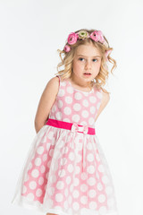 Pretty blonde kid on white background