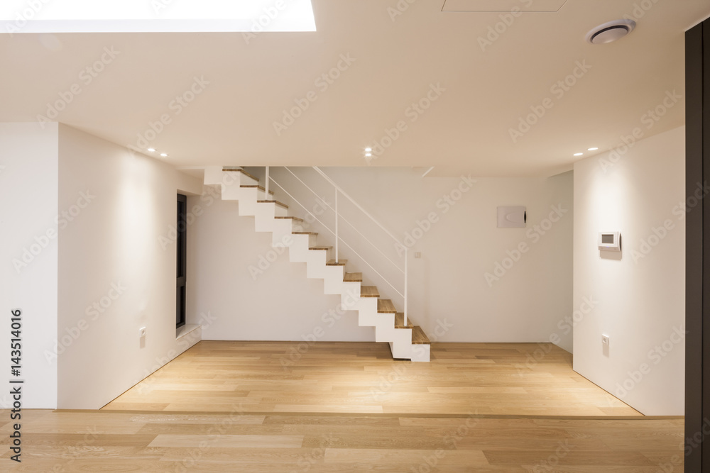 Wall mural white empty living room with stair, wood floor, window, pendant lighting.