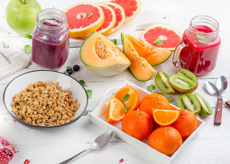Fresh smoothies,  muesli and berries.