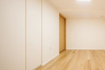 white empty room with wardrobe, window, door at the night.