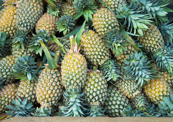 Fresh pineapples background