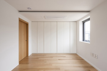 white empty room with window, wardrobe, door at the day.