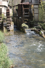 Fototapeta na wymiar Environment streams. Mills and industrial facilities