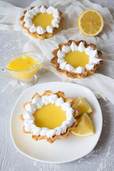 Three tartlets of shortcake with lemon cream
