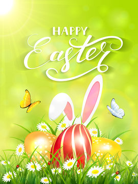 Green background with rabbit and three Easter eggs in grass