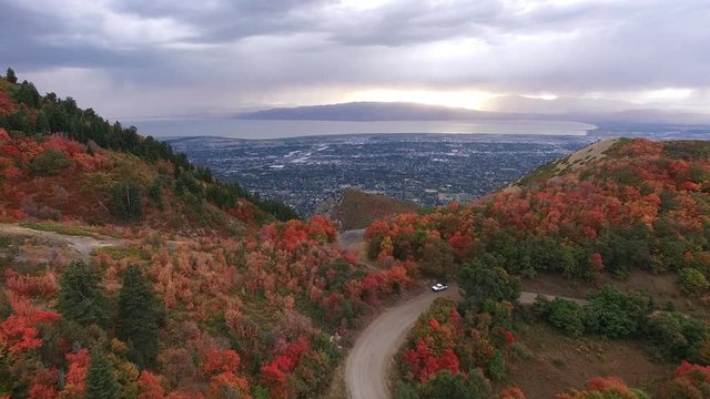 Aerial view on hillside above city during Fall.