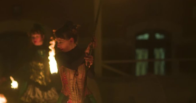 Fire performers playing with fire