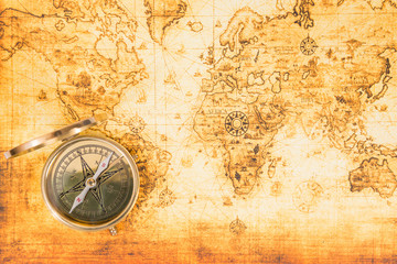 Obraz na płótnie Canvas Old map with an ancient compass