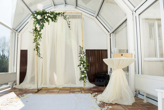 White wedding ceremony decorations indoor. Wedding when bad weather