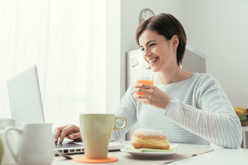 Fototapeta premium Woman having breakfast