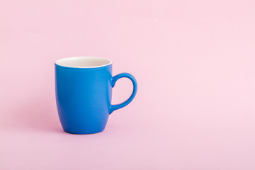Colorful Coffee Mug on Pink Background with Copy Space