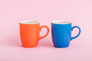 Colorful Coffee Mugs on Pink Background