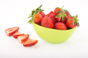 strawberries in a green bowl	