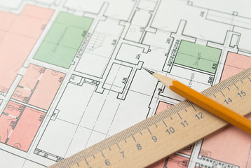 On the sheet of the drawing is a pencil with Notepad