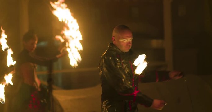Fire performers, fire show. Slow motion