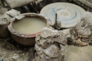 Earthenware tool and Clay, selective focus (detailed close-up shot)