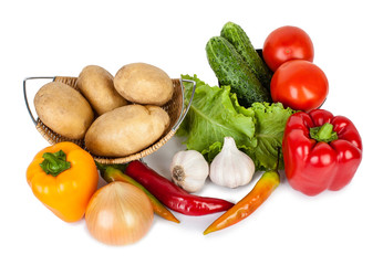 Isolated vegetables and lettuce leaves. Healthy food on a white background