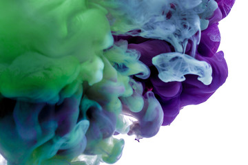 colorful ink. purple blue drop swirling under water. Cloud of ink in water. abstract background