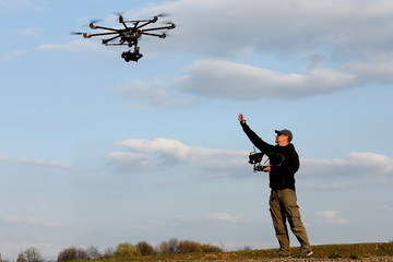 drone pilot, UAV , Multirotor, Photography,  Helicopter
 - obrazy, fototapety, plakaty
