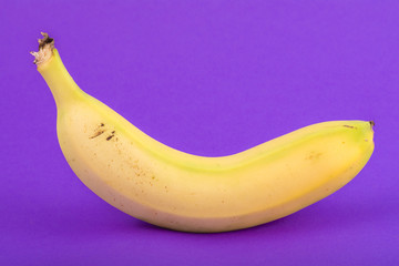 banana on violet background