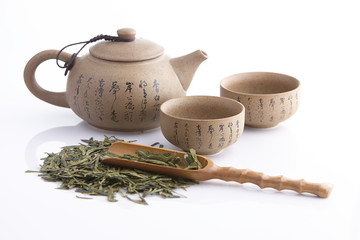 Traditional tea ceremony accessories, teapot and teacup with white background