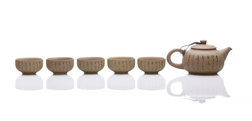 Traditional tea ceremony accessories, teapot and teacup with white background