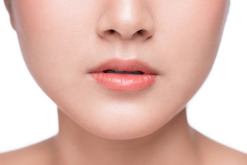 Obraz premium Young asian woman close up. Perfect natural lip makeup