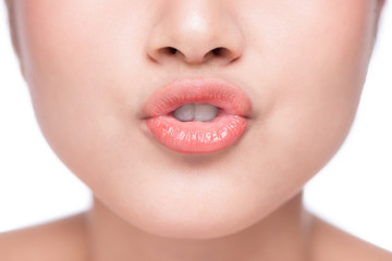 Young asian woman close up. Perfect natural lip makeup