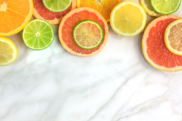  Grapefruit, lime, lemon, and orange slices with copyspace