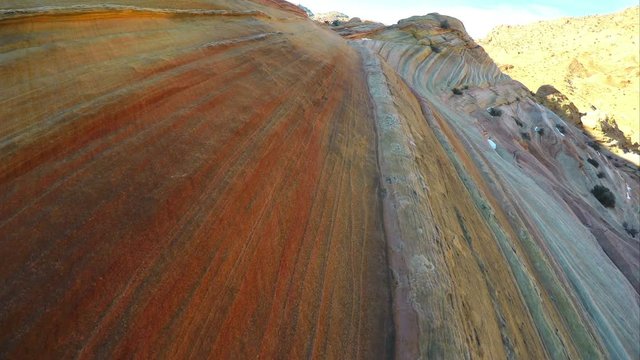Gliding over the stripes in the sandstone near the Wave.