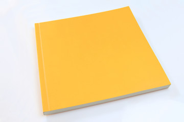 Yellow book on white background