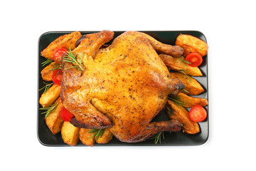 Plate with roasted beer can chicken on white background