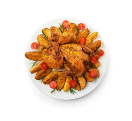 Plate with roasted beer can chicken on white background