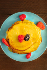 Freshly baked homemade pancakes with fresh fruit