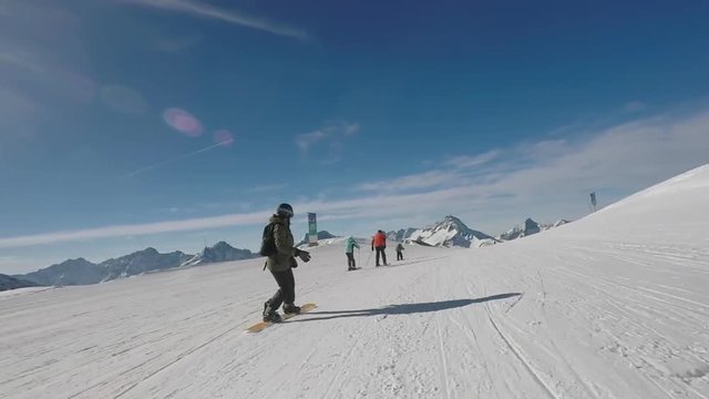 Snowboard action, low angle.
