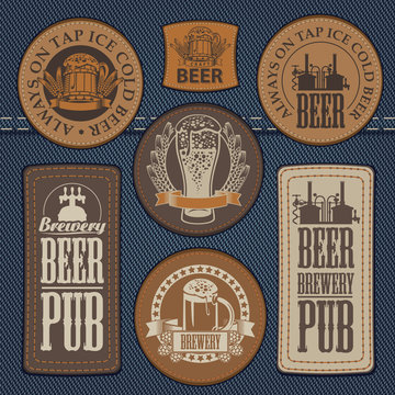 vector set of labels for jeans with pictures on the topic of beer pub on a background of denim
