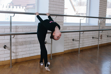Fototapeta premium A modern gymnast in a dance class.