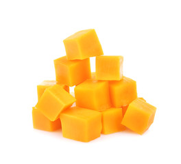 Delicious pieces of cheddar on white background