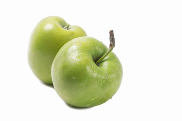 Two large whole green appetizing apple