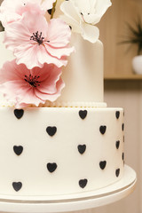 Fototapeta na wymiar Wedding cake with orchids marzipan