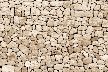 beige sandstone wall