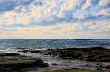 Fototapeta na wymiar background of beach and sea at sunset colors