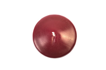 Purple candle on white background